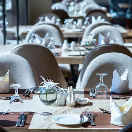 Vittori Palace Hotel And Residences Riyadh Eksteriør bilde A table set for fine dining