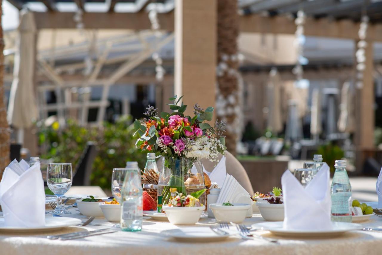 Vittori Palace Hotel And Residences Riyadh Eksteriør bilde A table set for a meal