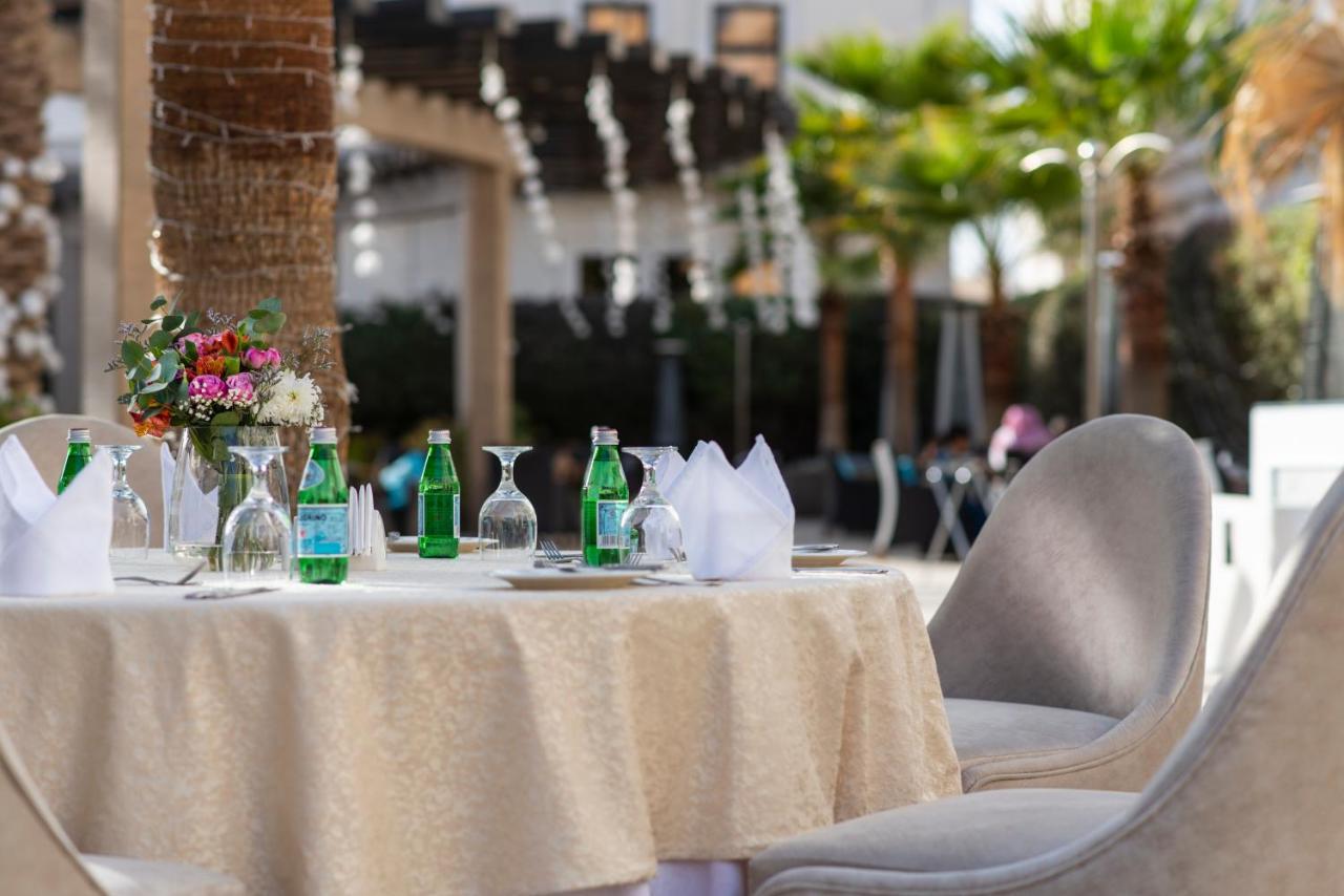 Vittori Palace Hotel And Residences Riyadh Eksteriør bilde A table set for a meal